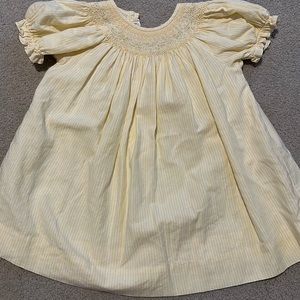 Yellow embroidered smock dress with floral detail